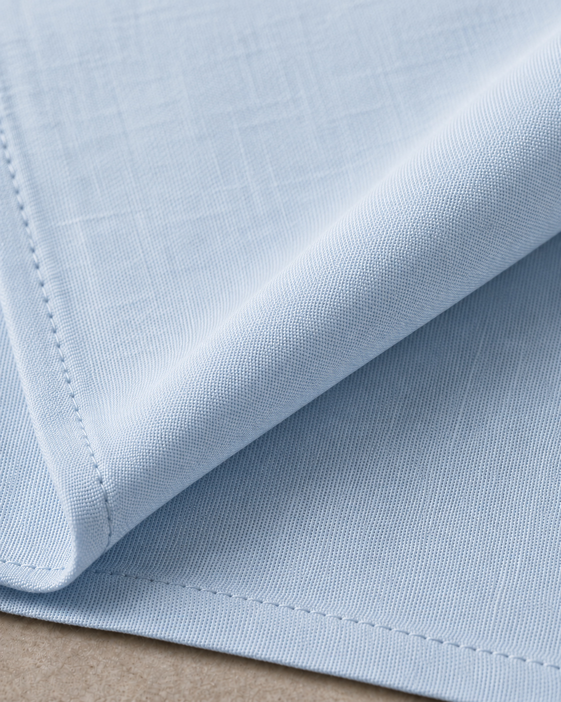 Close-up of the slub weave of Otoko Style pure cotton-linen fabric in sky blue