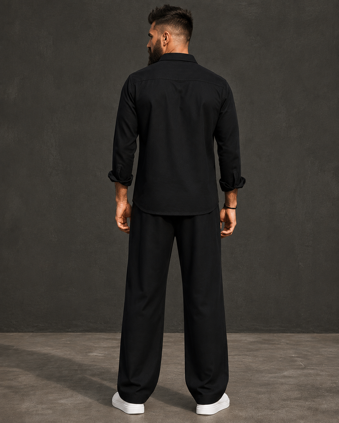 Man in a black pure cotton-linen co-ord set styled for winter