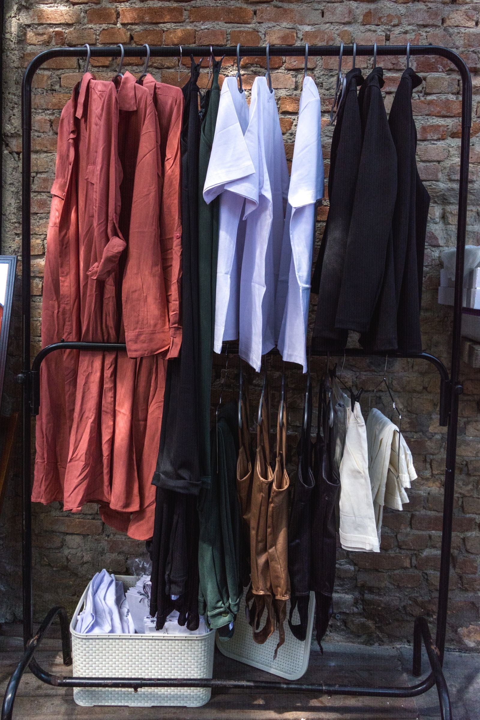 Colourful shirts on a clothes rack - choosing the best co-ord set colours for Indian skin tones