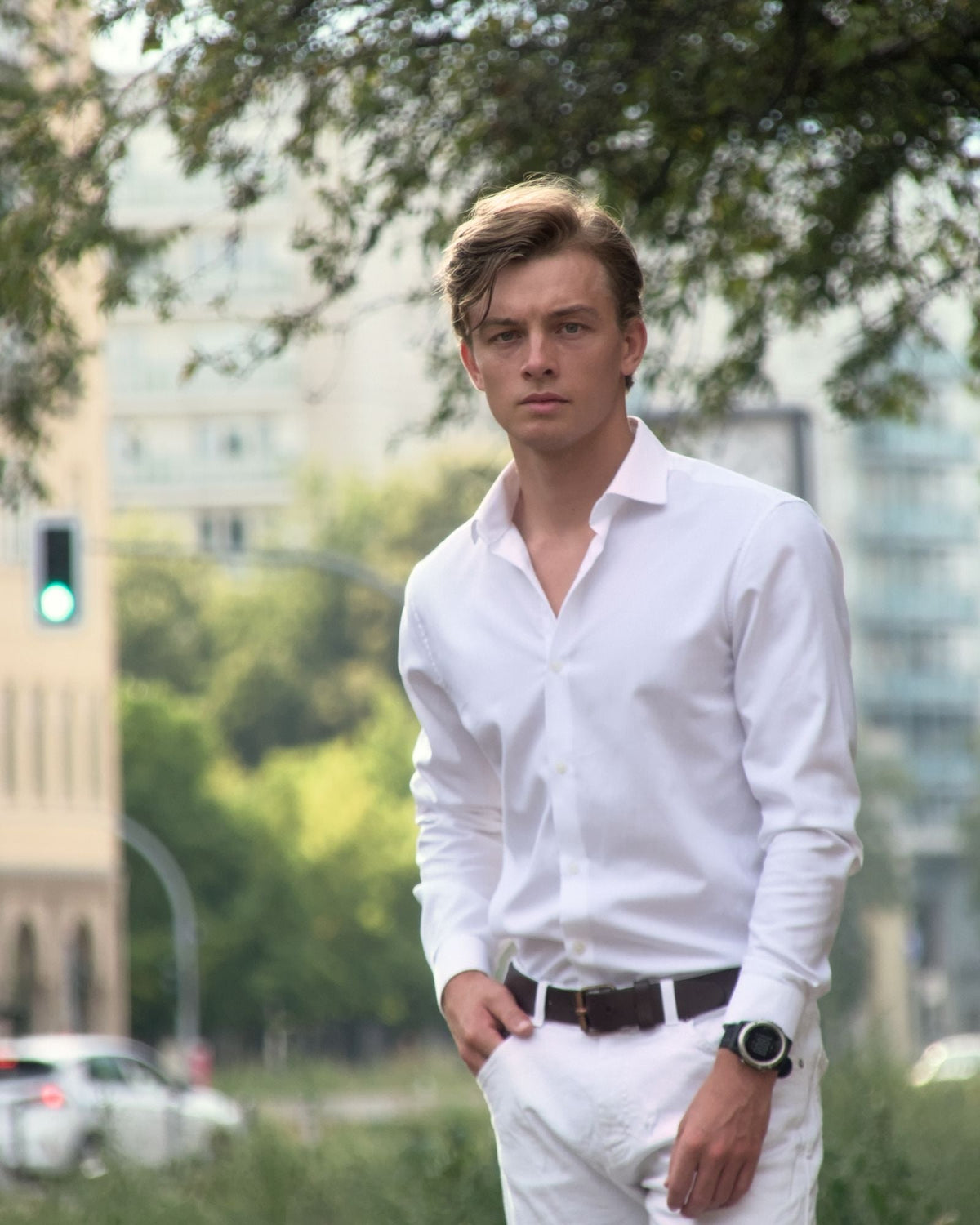 How to style a white co-ord set for men: a man in a white linen outfit in summer